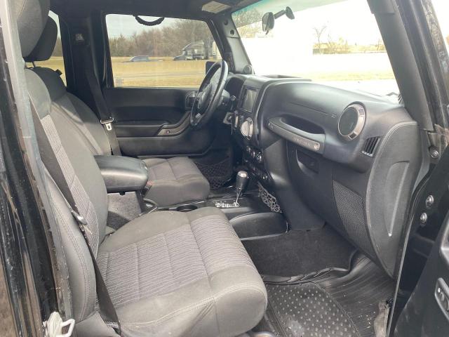 Photo 5 from auction – 2012 JEEP WRANGLER U with VIN 1C4HJWDG1CL247699
