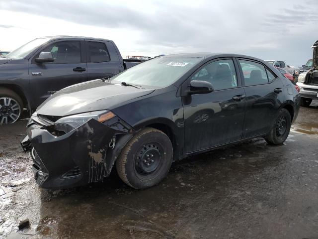 TOYOTA COROLLA L 2018 with VIN 5YFBURHE7JP802358 - Photo from auction