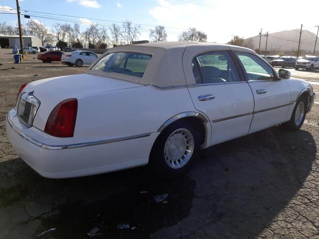 Photo 3 from auction – 2002 LINCOLN TOWN CAR E with VIN 1LNHM81W62Y611482