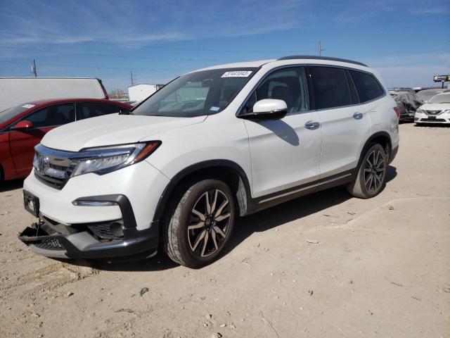 HONDA PILOT TOUR 2020 with VIN 5FNYF5H91LB015811 - Photo from auction