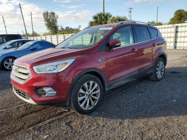FORD ESCAPE TIT 2017 with VIN 1FMCU0J92HUF09456 - Photo from auction