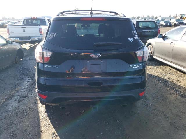 Photo 6 from auction – 2017 FORD ESCAPE TIT with VIN 1FMCU0J9XHUE09668
