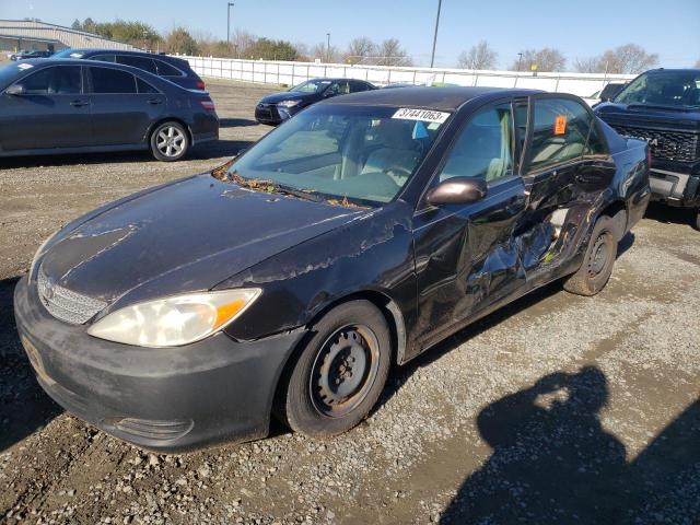 TOYOTA CAMRY LE 2003 with VIN JTDBE32K530148983 - Photo from auction