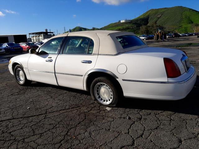 Photo 2 from auction – 2002 LINCOLN TOWN CAR E with VIN 1LNHM81W62Y611482