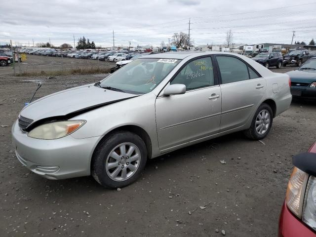 TOYOTA CAMRY LE 2002 with VIN JTDBE32K520115903 - Photo from auction
