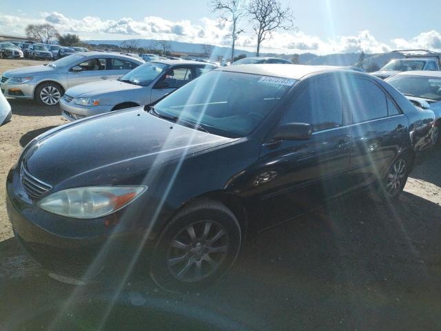 TOYOTA CAMRY LE 2005 with VIN 4T1BE32K95U411824 - Photo from auction