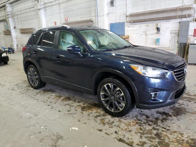 Photo 4 from auction – 2016 MAZDA CX-5 GT with VIN JM3KE2DY2G0830180