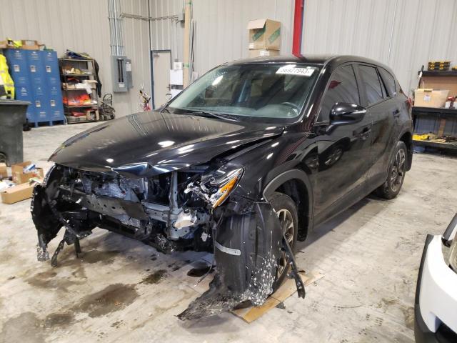 MAZDA CX-5 GT 2016 with VIN JM3KE4DY3G0913368 - Photo from auction