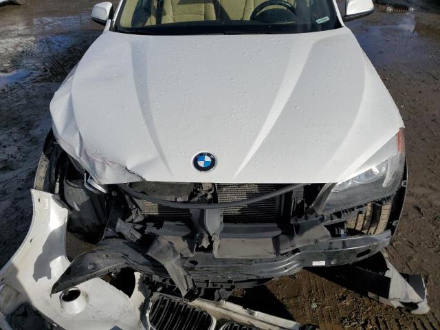 Photo 11 from auction – 2013 BMW X1 SDRIVE2 with VIN WBAVM1C56DVW44261