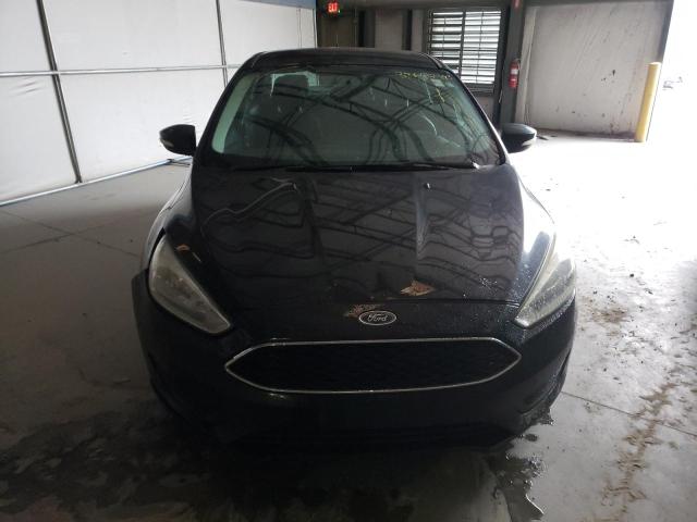 Photo 5 from auction – 2016 FORD FOCUS SE with VIN 1FADP3F21GL290769