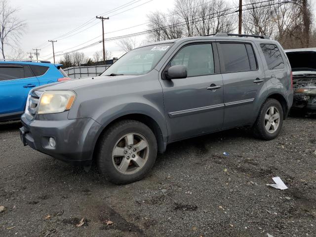 HONDA PILOT EXL 2011 with VIN 5FNYF4H53BB001849 - Photo from auction