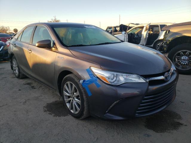 Photo 4 from auction – 2015 TOYOTA CAMRY HYBR with VIN 4T1BD1FK3FU176825