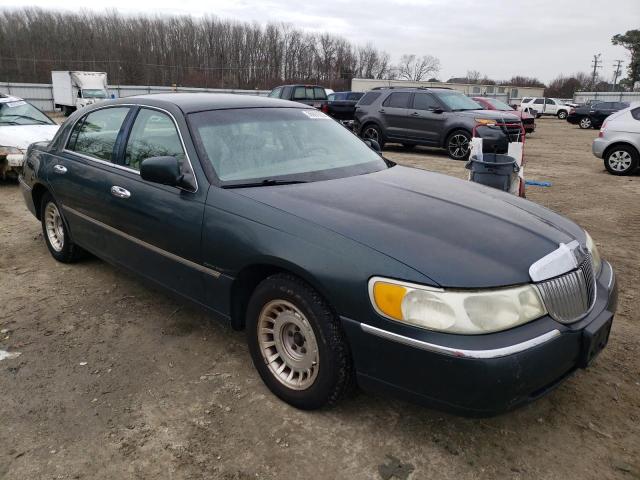 Photo 4 from auction – 2002 LINCOLN TOWN CAR E with VIN 1LNHM81W82Y609636
