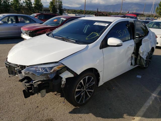 TOYOTA COROLLA L 2018 with VIN 5YFBURHE9JP797681 - Photo from auction