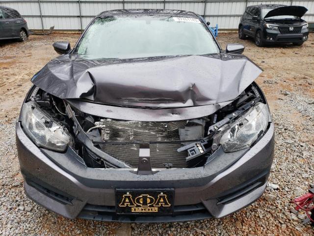 Photo 11 from auction – 2016 HONDA CIVIC LX with VIN 19XFC2E52GE041328