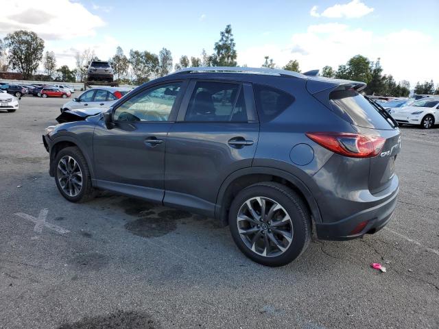 Photo 2 from auction – 2016 MAZDA CX-5 GT with VIN JM3KE2DY8G0883899