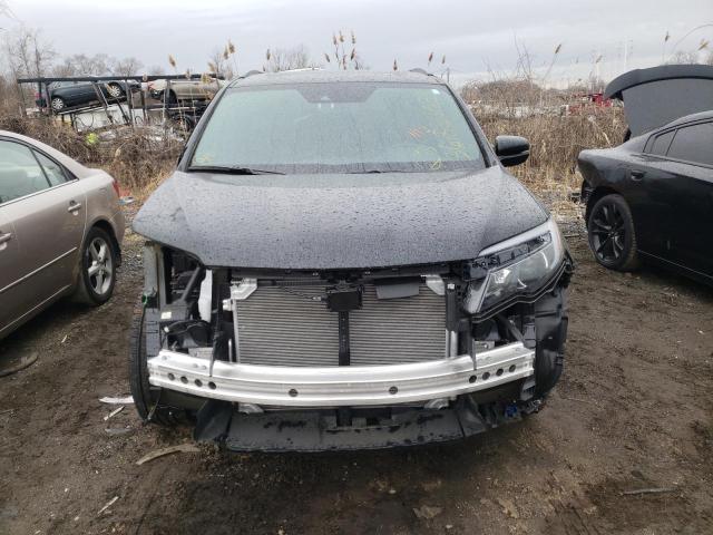 Photo 5 from auction – 2022 HONDA PILOT TRAI with VIN 5FNYF6H80NB023110