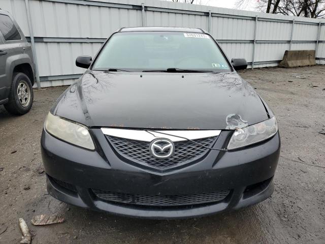 Photo 5 from auction – 2003 MAZDA 6 I with VIN 1YVHP80C935M19571
