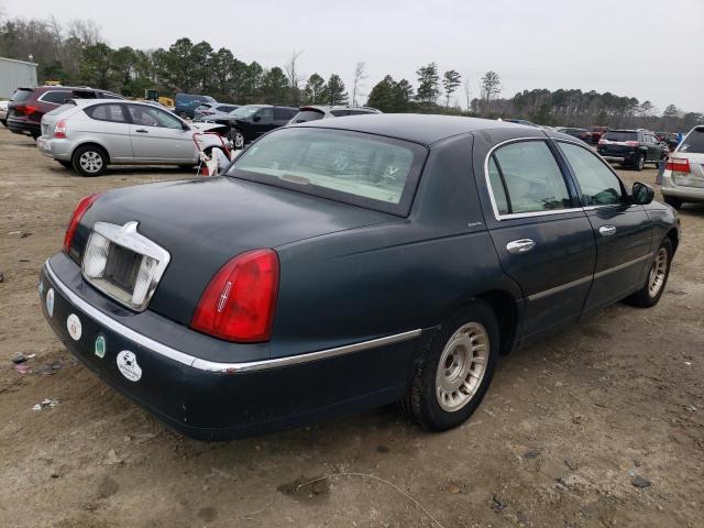 Photo 3 from auction – 2002 LINCOLN TOWN CAR E with VIN 1LNHM81W82Y609636