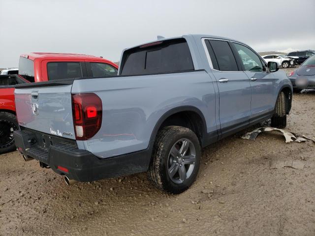 Photo 3 from auction – 2022 HONDA RIDGELINE with VIN 5FPYK3F77NB012584