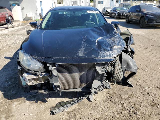 Photo 5 from auction – 2016 HONDA CIVIC LX with VIN 19XFC2F59GE072249