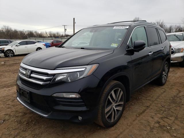 HONDA PILOT TOUR 2016 with VIN 5FNYF6H96GB012897 - Photo from auction