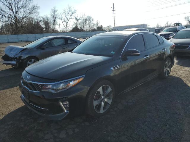KIA OPTIMA SX 2018 with VIN 5XXGW4L29JG244120 - Photo from auction
