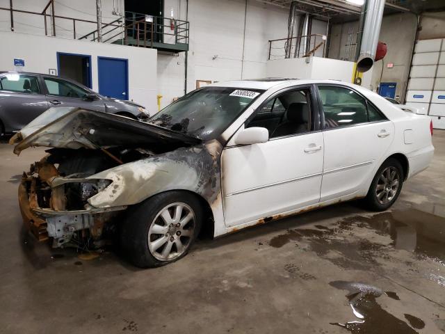 TOYOTA CAMRY LE 2003 with VIN 4T1BF30K53U046426 - Photo from auction