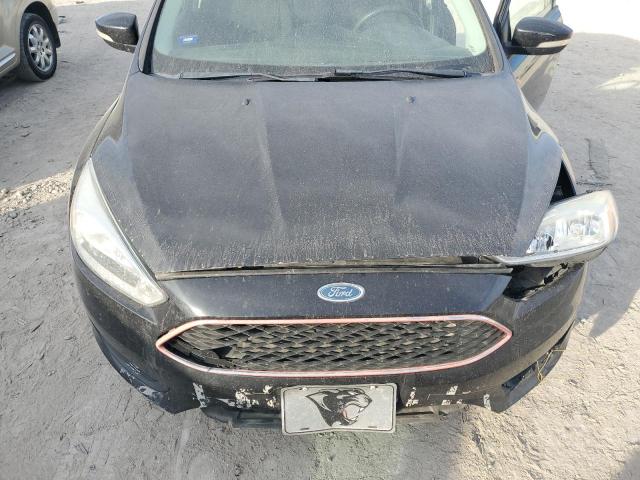 Photo 11 from auction – 2015 FORD FOCUS SE with VIN 1FADP3F26FL207643