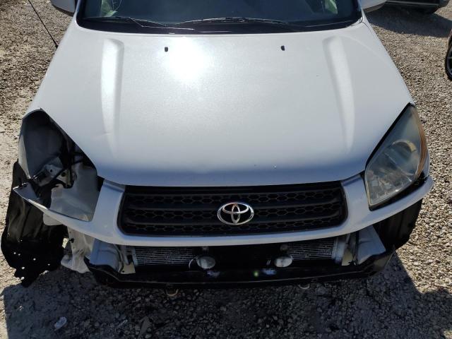 Photo 12 from auction – 2002 TOYOTA RAV4 with VIN JTEGH20V120046238