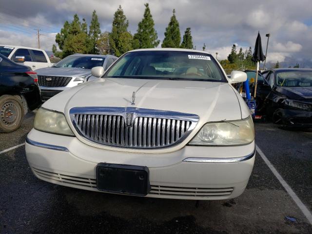 Photo 5 from auction – 2004 LINCOLN TOWN CAR U with VIN 1LNHM83W64Y647544