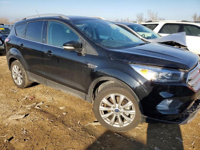 Photo 4 from auction – 2018 FORD ESCAPE TIT with VIN 1FMCU9J94JUC34683