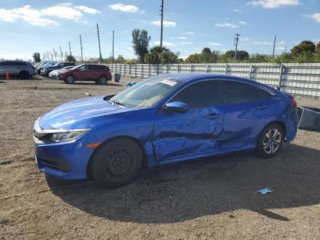HONDA CIVIC LX 2017 with VIN 19XFC2F57HE039882 - Photo from auction