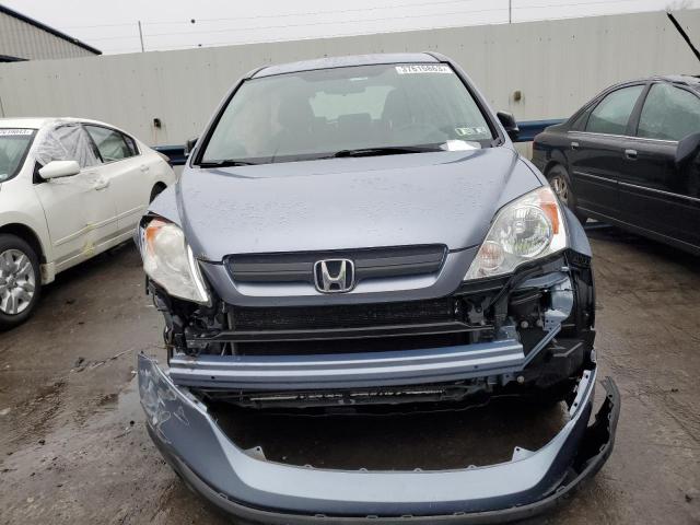 Photo 5 from auction – 2007 HONDA CR-V LX with VIN JHLRE38347C034236