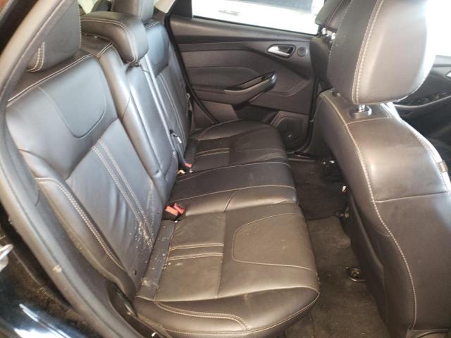Photo 10 from auction – 2014 FORD FOCUS TITA with VIN 1FADP3J27EL378536