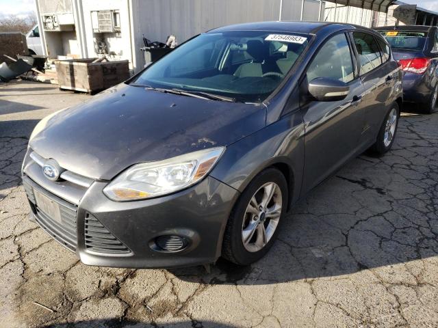 FORD FOCUS SE 2014 with VIN 1FADP3K23EL111733 - Photo from auction