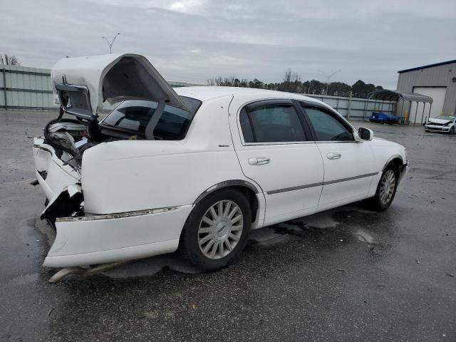 Photo 3 from auction – 2003 LINCOLN TOWN CAR E with VIN 1LNHM81W23Y629768