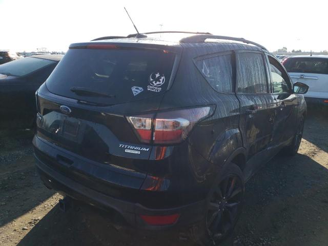 Photo 3 from auction – 2017 FORD ESCAPE TIT with VIN 1FMCU0J9XHUE09668