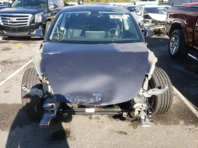 Photo 5 from auction – 2022 TESLA MODEL 3 with VIN 5YJ3E1EA1NF189580