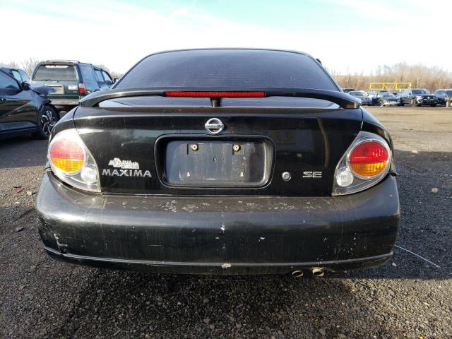 Photo 6 from auction – 2002 NISSAN MAXIMA GLE with VIN JN1DA31A72T323635