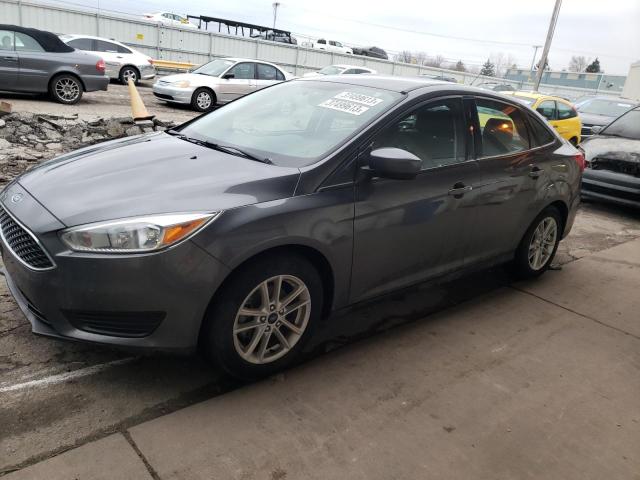 FORD FOCUS SE 2018 with VIN 1FADP3F21JL266852 - Photo from auction