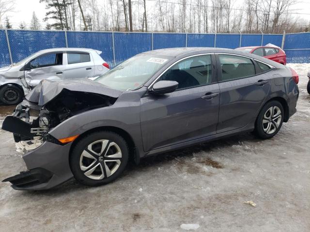 HONDA CIVIC LX 2018 with VIN 2HGFC2E5XJH002841 - Photo from auction