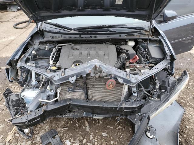 Photo 11 from auction – 2014 TOYOTA COROLLA L with VIN 2T1BURHEXEC097433