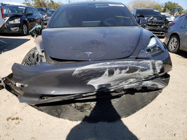 Photo 5 from auction – 2022 TESLA MODEL 3 with VIN 5YJ3E1EC9NF125272