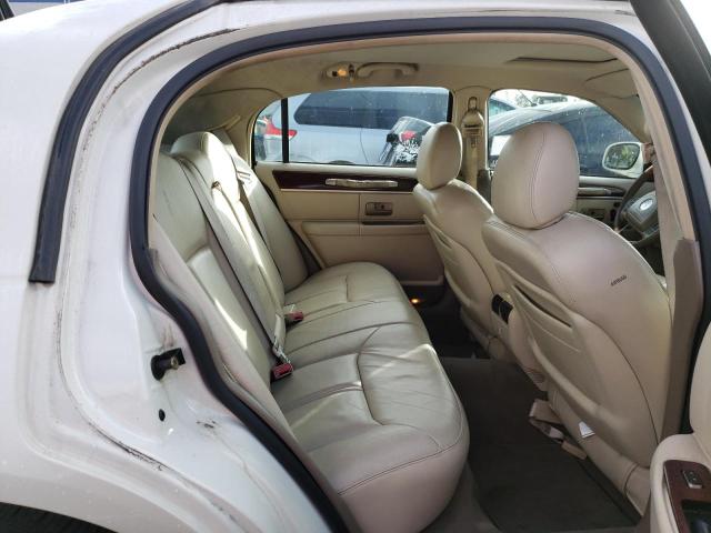 Photo 10 from auction – 2004 LINCOLN TOWN CAR U with VIN 1LNHM83W64Y647544