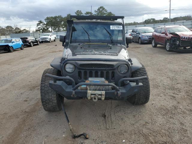 Photo 5 from auction – 2015 JEEP WRANGLER U with VIN 1C4BJWDG7FL653237