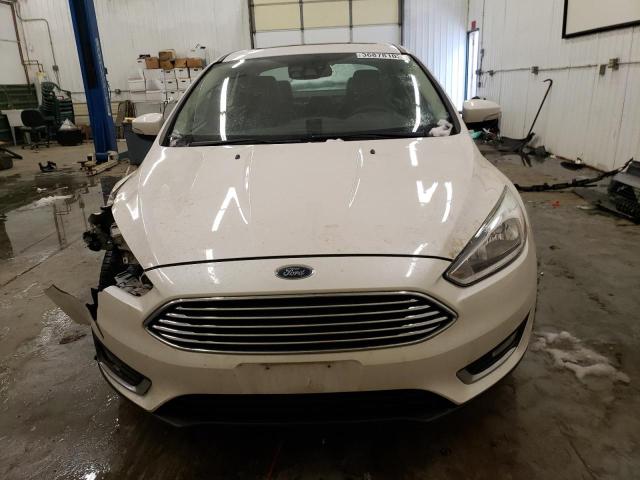 Photo 5 from auction – 2015 FORD FOCUS TITA with VIN 1FADP3J2XFL353146