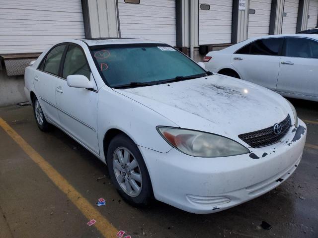 Photo 4 from auction – 2002 TOYOTA CAMRY LE with VIN 4T1BE30K22U098484