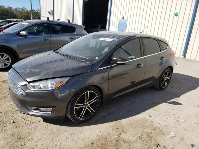 FORD FOCUS TITA 2017 with VIN 1FADP3N23HL212867 - Photo from auction