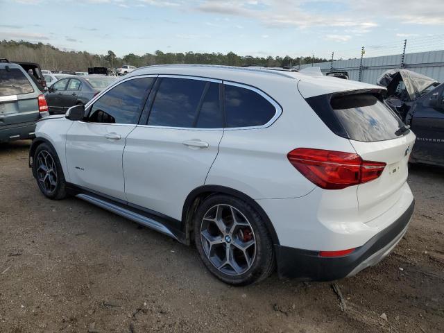 Photo 2 from auction – 2016 BMW X1 XDRIVE2 with VIN WBXHT3C32GP886277